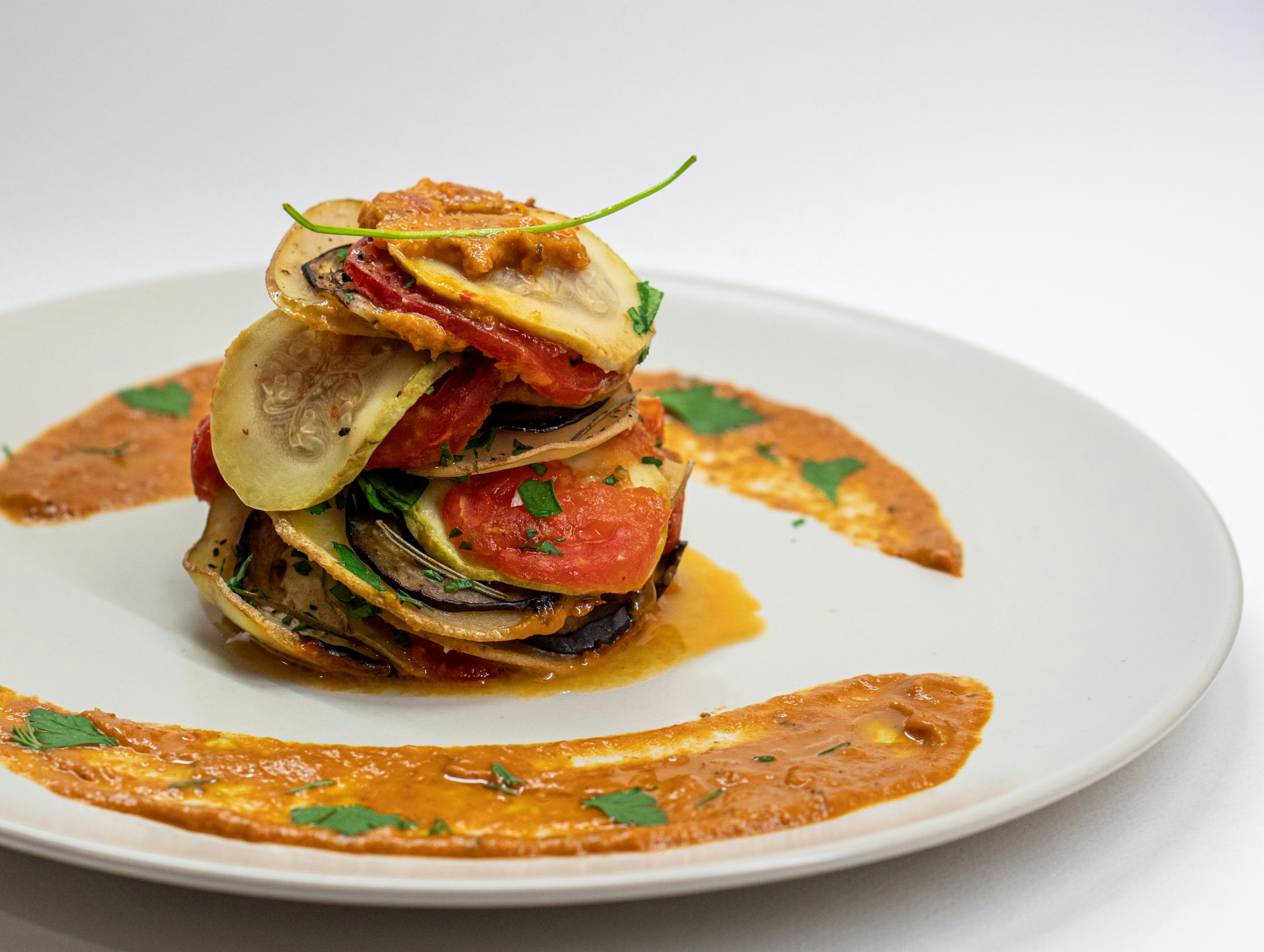 Beautiful layered ratatouille in a baking dish